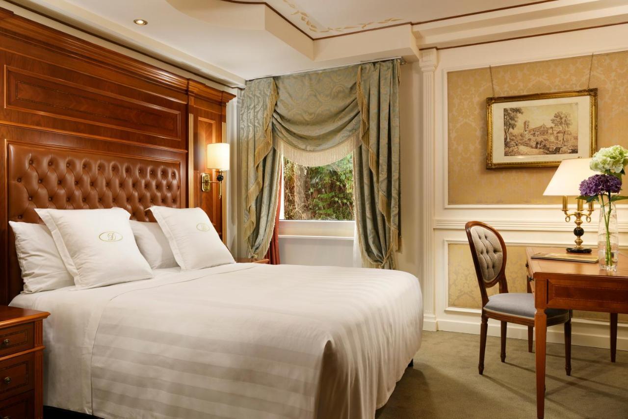 Swiss Diamond Hotel & Spa Morcote Esterno foto A room at the hotel